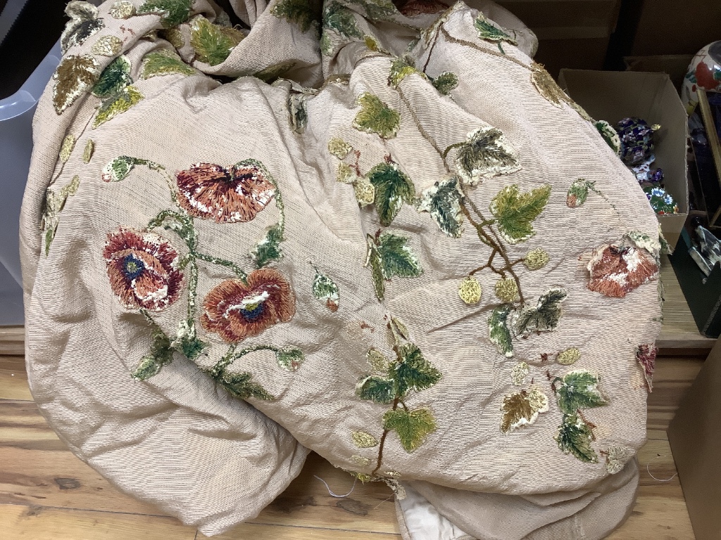 A Religious brocade cape, altered, with damage, together with an applied panel of embroidered flowers and leaves, embroidery moth and damaged